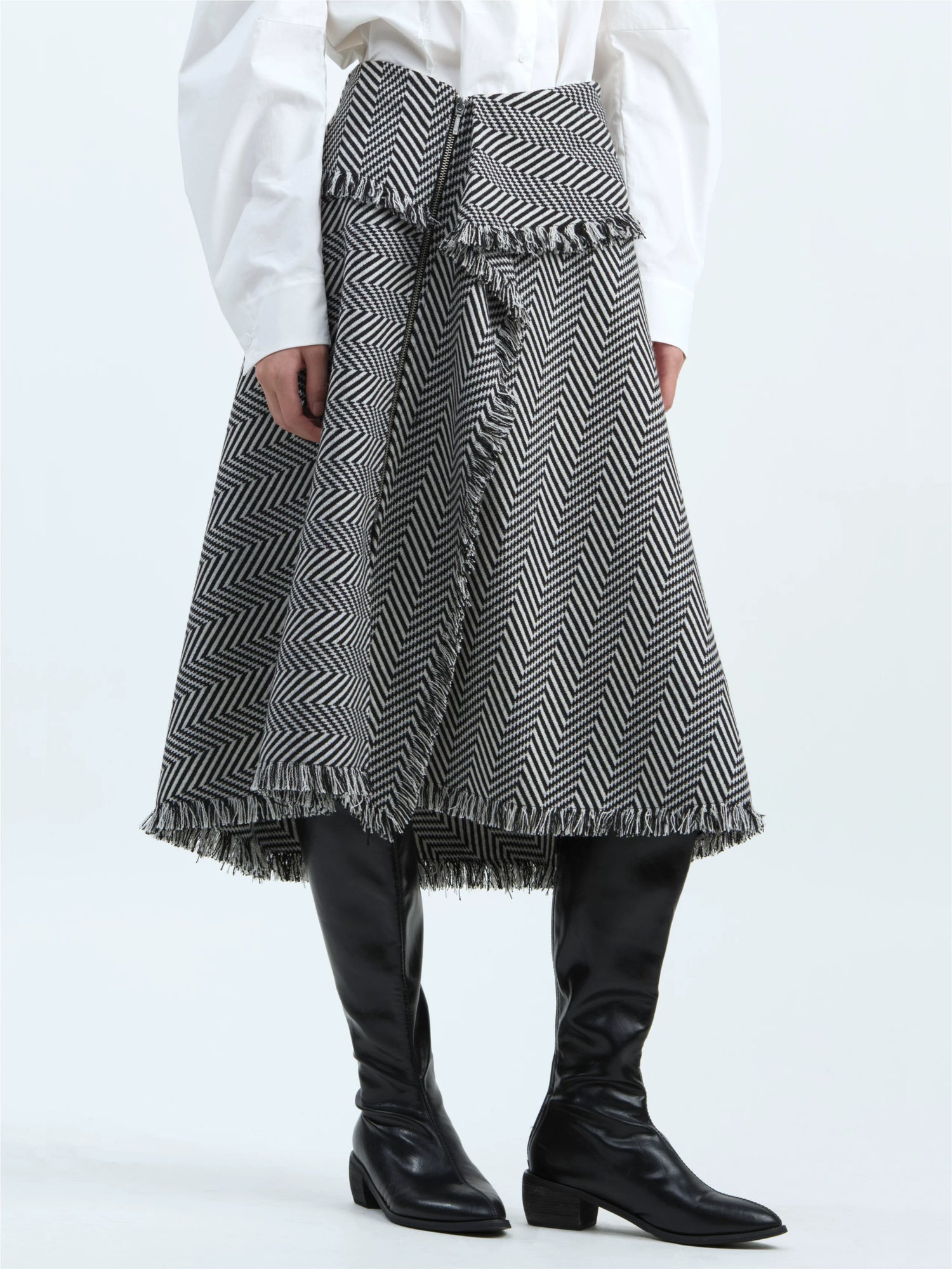 Black-and-white striped skirt with tassel trim